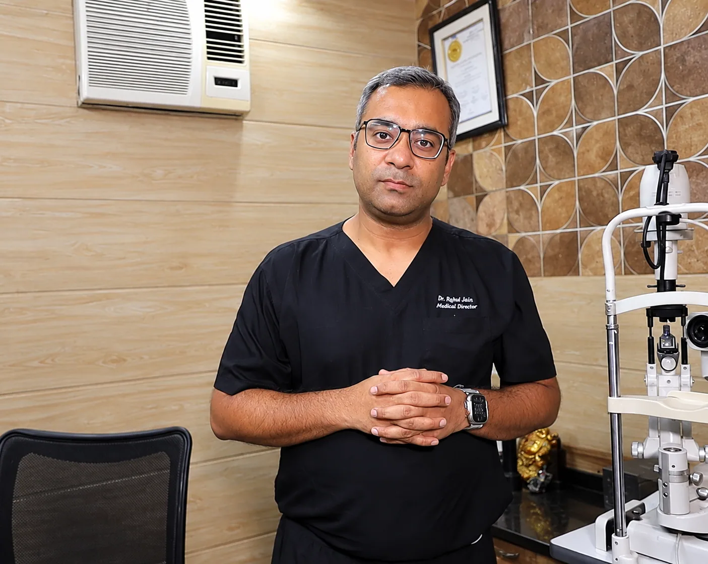 Eye-care clinician in a hospital consultation area
